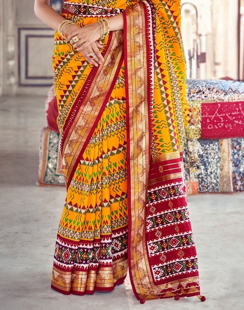 Collection of Mustard Geometric Print Patola Saree in a gallery layout