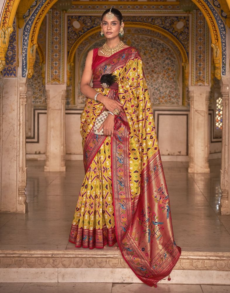 Collection of Mustard Ikat Print Patola Fancy Saree in a gallery layout