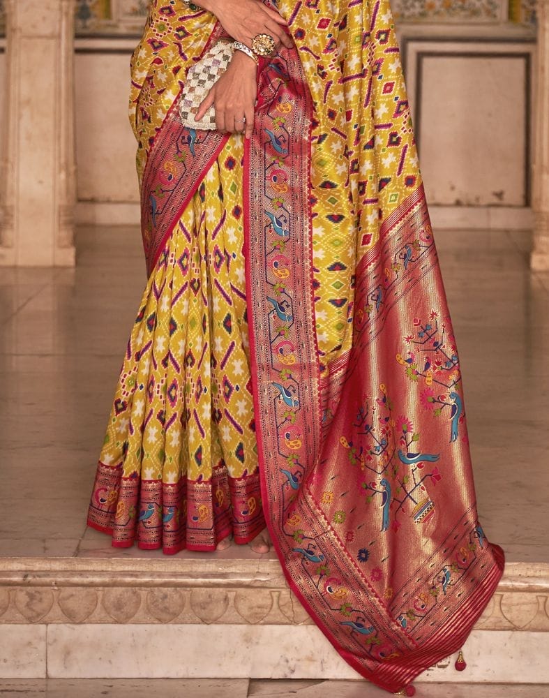 Collection of Mustard Ikat Print Patola Fancy Saree in a gallery layout