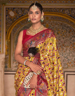 Collection of Mustard Ikat Print Patola Fancy Saree in a gallery layout