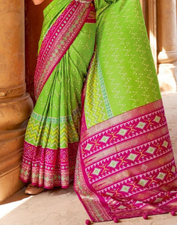 Collection of Parrot Green Chevron Patola Fabric Saree in a gallery layout