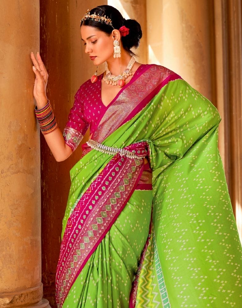 Collection of Parrot Green Chevron Patola Fabric Saree in a gallery layout