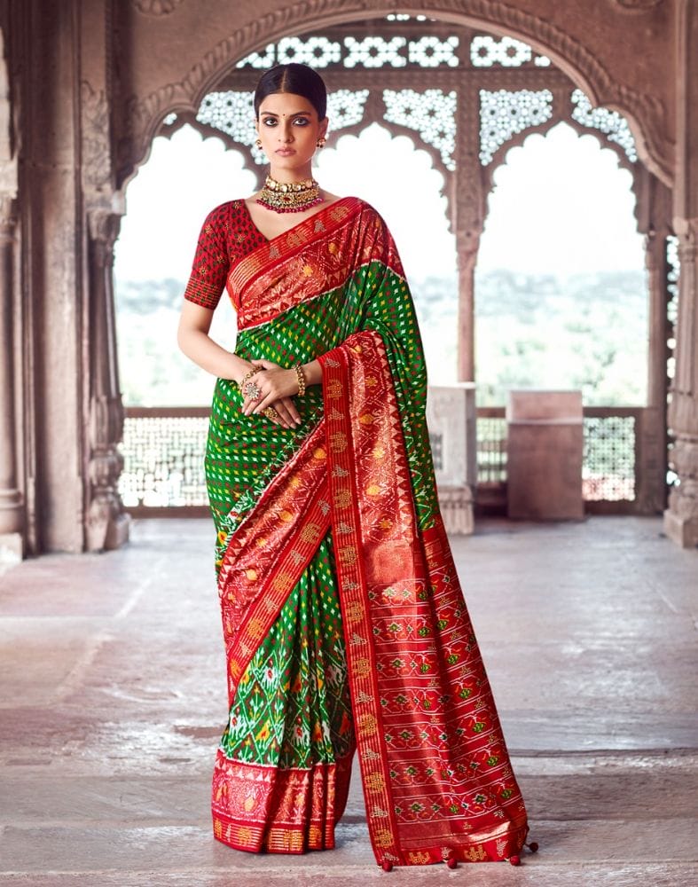 Collection of Green Ikat Pattern Patola Fabric Saree in a gallery layout