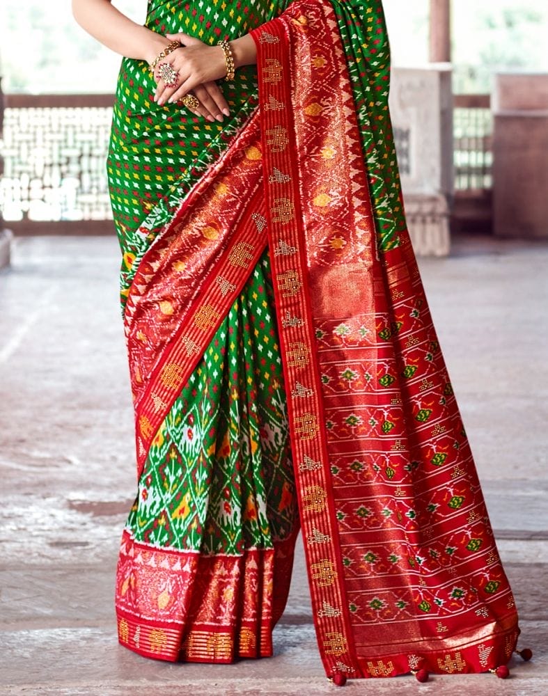 Collection of Green Ikat Pattern Patola Fabric Saree in a gallery layout