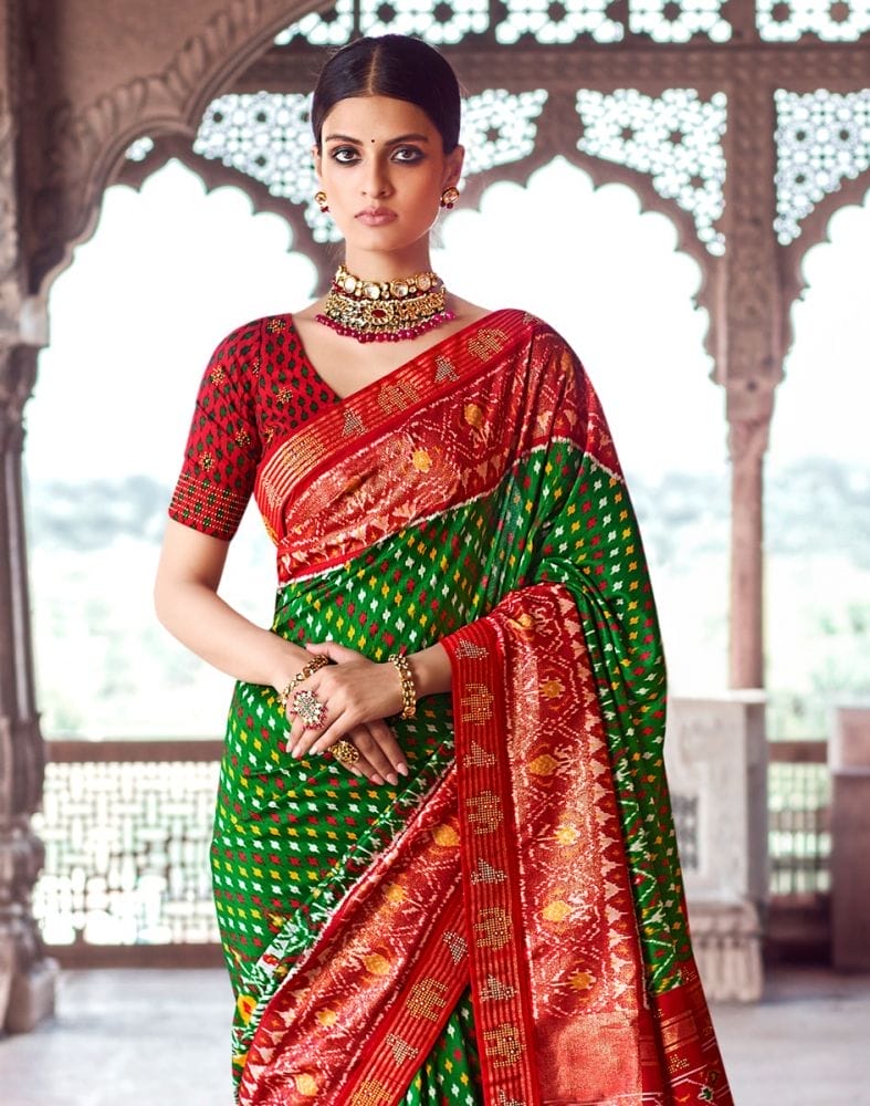 Collection of Green Ikat Pattern Patola Fabric Saree in a gallery layout