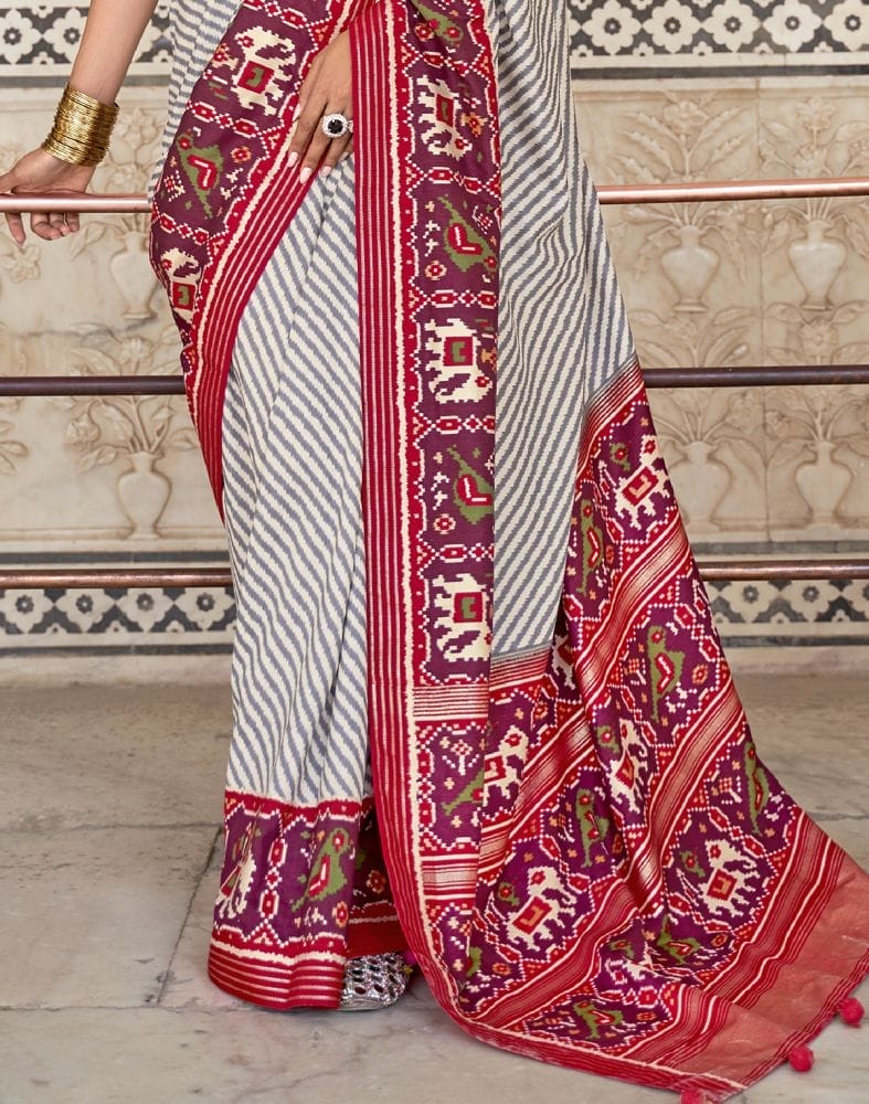 Collection of Grey and Red Weaving Patola Saree in a gallery layout