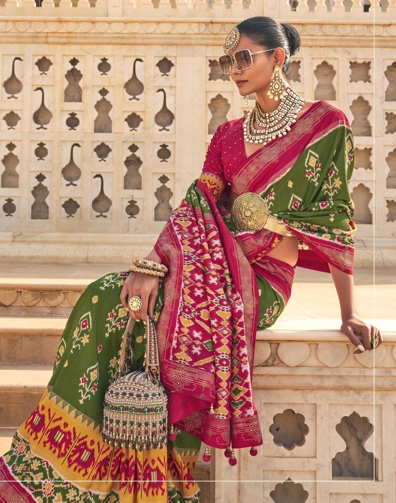 Collection of Stylish Mehendi Green Ikat Print Patola Saree in a gallery layout