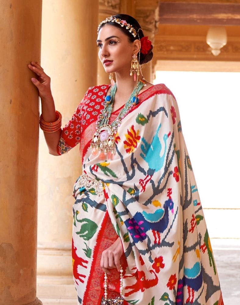 Collection of Off White Novelty Pattern Patola Saree in a gallery layout