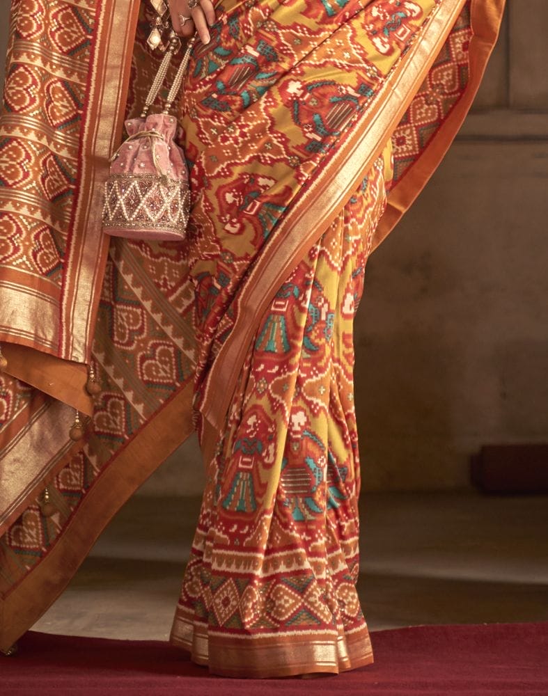 Collection of Orange Ikat Weaving Patola Saree in a gallery layout