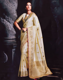 Collection of Cream Floral Banaras Tissue Saree in a gallery layout