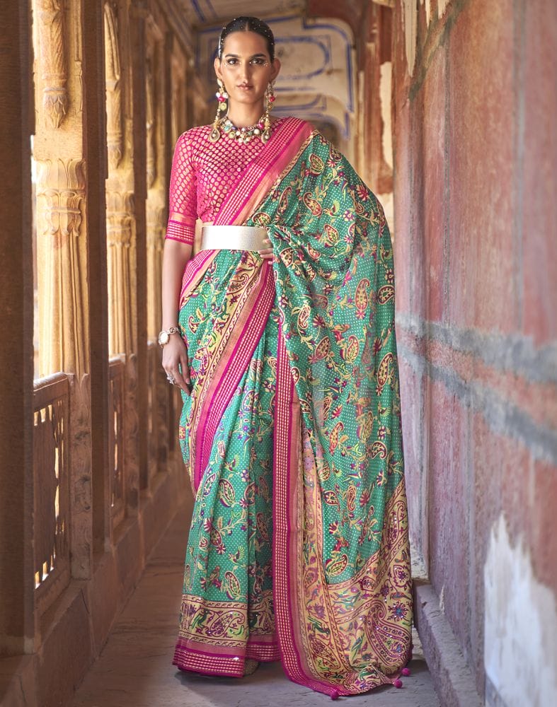 Collection of Glamorous Patola Green Coloured Saree in a gallery layout