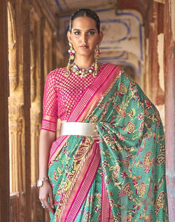 Collection of Glamorous Patola Green Coloured Saree in a gallery layout