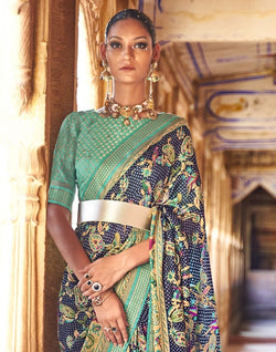 Collection of Imposing Navy Blue Botanical Print Patola Saree in a gallery layout