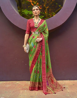 Collection of Green Paisley Pattern Brasso Fabric Saree in a gallery layout