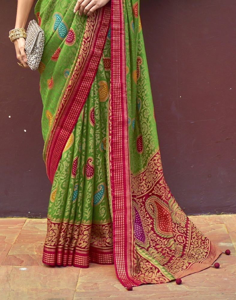 Collection of Green Paisley Pattern Brasso Fabric Saree in a gallery layout