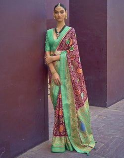 Collection of Magenta and Sea Green Coloured Brasso Saree in a gallery layout