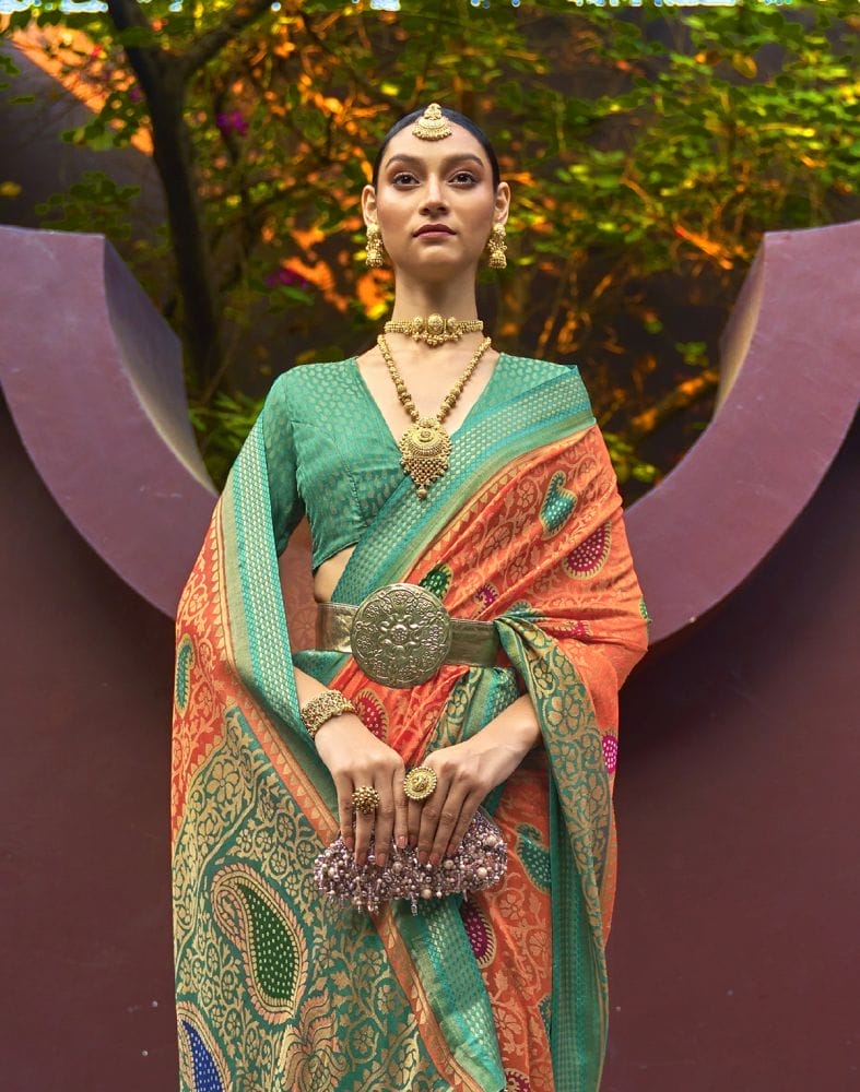 Collection of Orange Coloured Paisley Brasso Printed Saree in a gallery layout