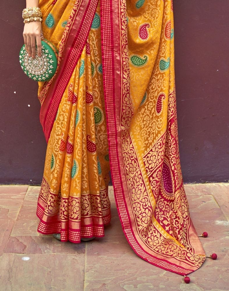 Collection of Mustard Coloured Paisley Brasso Fabric Saree in a gallery layout