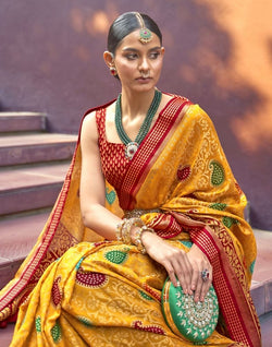 Collection of Mustard Coloured Paisley Brasso Fabric Saree in a gallery layout