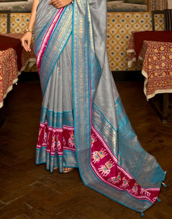 Collection of Patola Grey Coloured Saree in a gallery layout