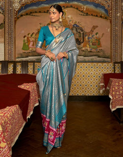 Collection of Patola Grey Coloured Saree in a gallery layout