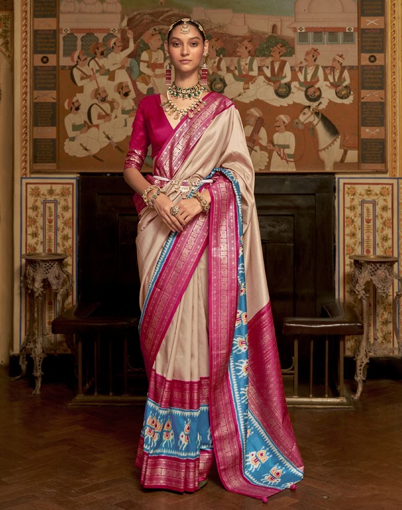 Collection of Cream Coloured Patola Fabric Saree in a gallery layout