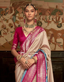 Collection of Cream Coloured Patola Fabric Saree in a gallery layout