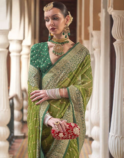 Collection of Parrot Green Zig Zag Pattern Georgette Saree in a gallery layout