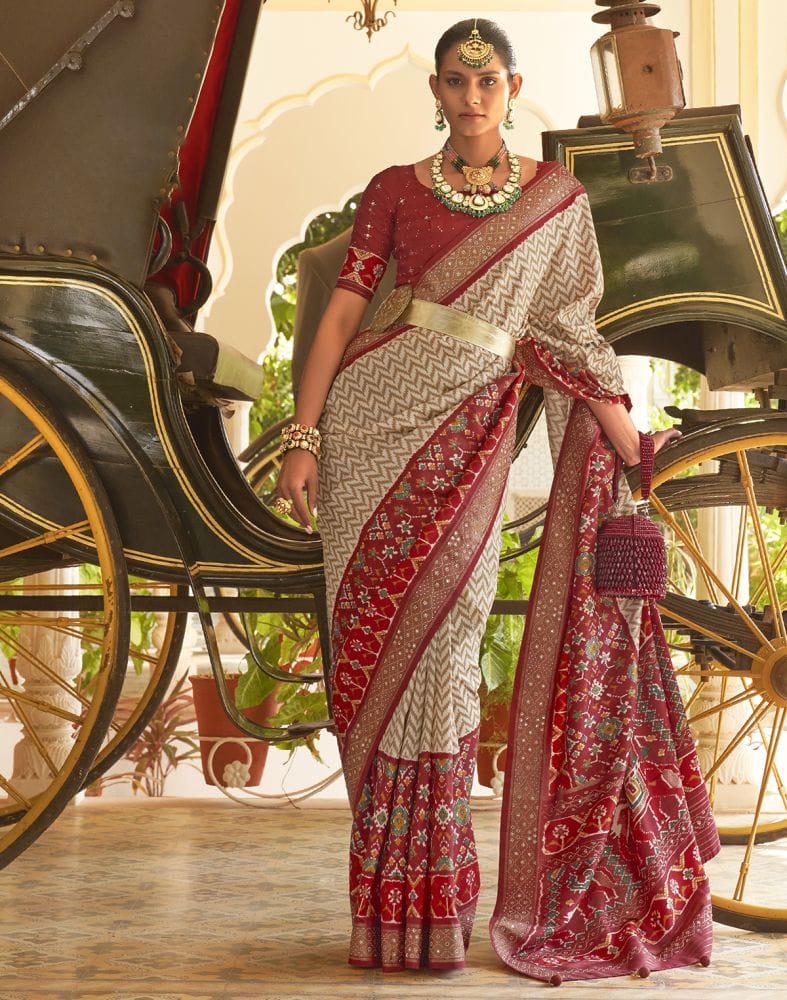 Collection of Chevron Pattern Beige Coloured Beads work Patola Fancy Saree in a gallery layout