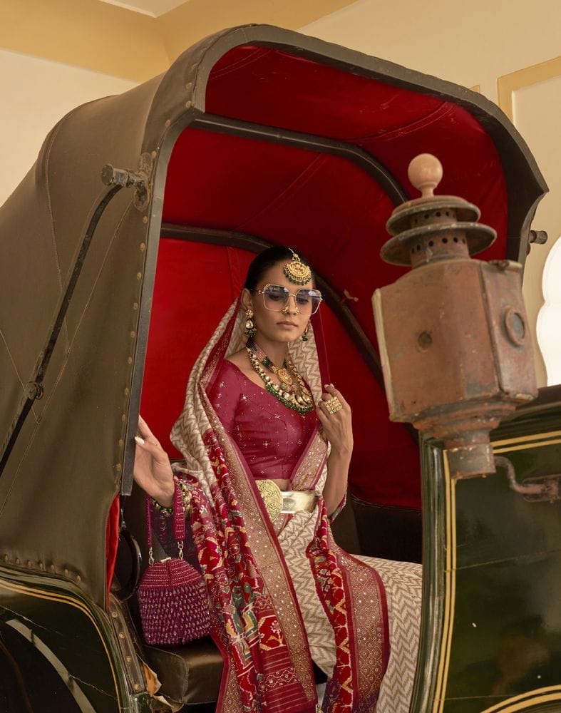 Collection of Chevron Pattern Beige Coloured Beads work Patola Fancy Saree in a gallery layout