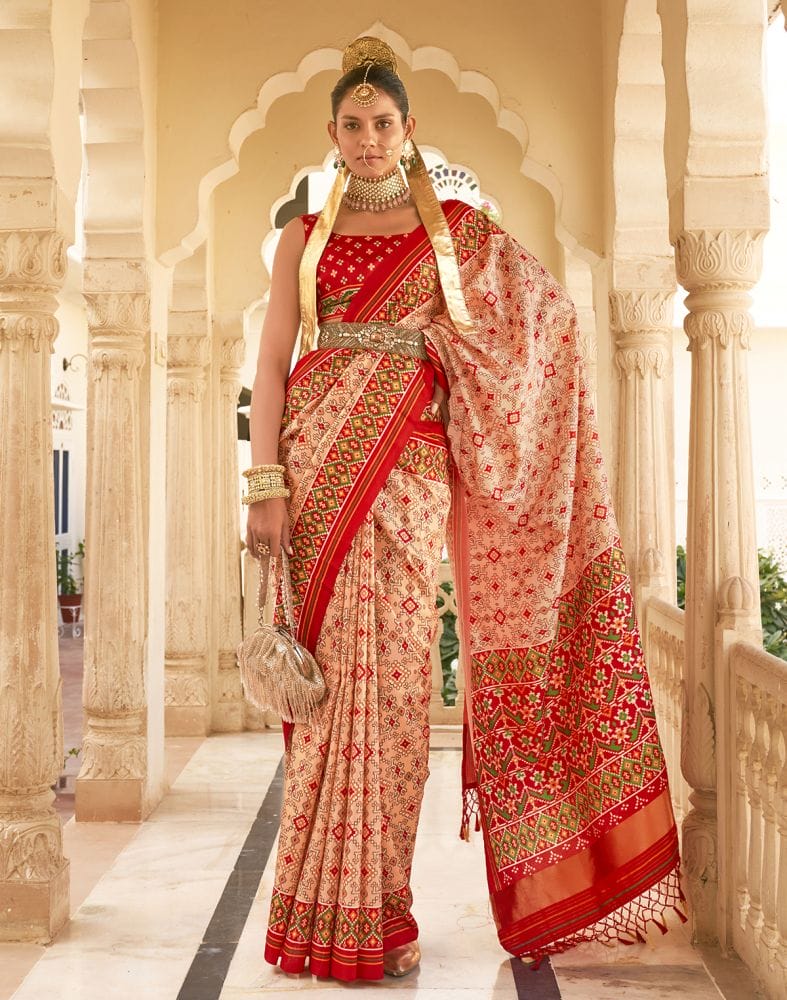 Collection of Peach Coloured Ikat Print Patola Fancy Saree in a gallery layout