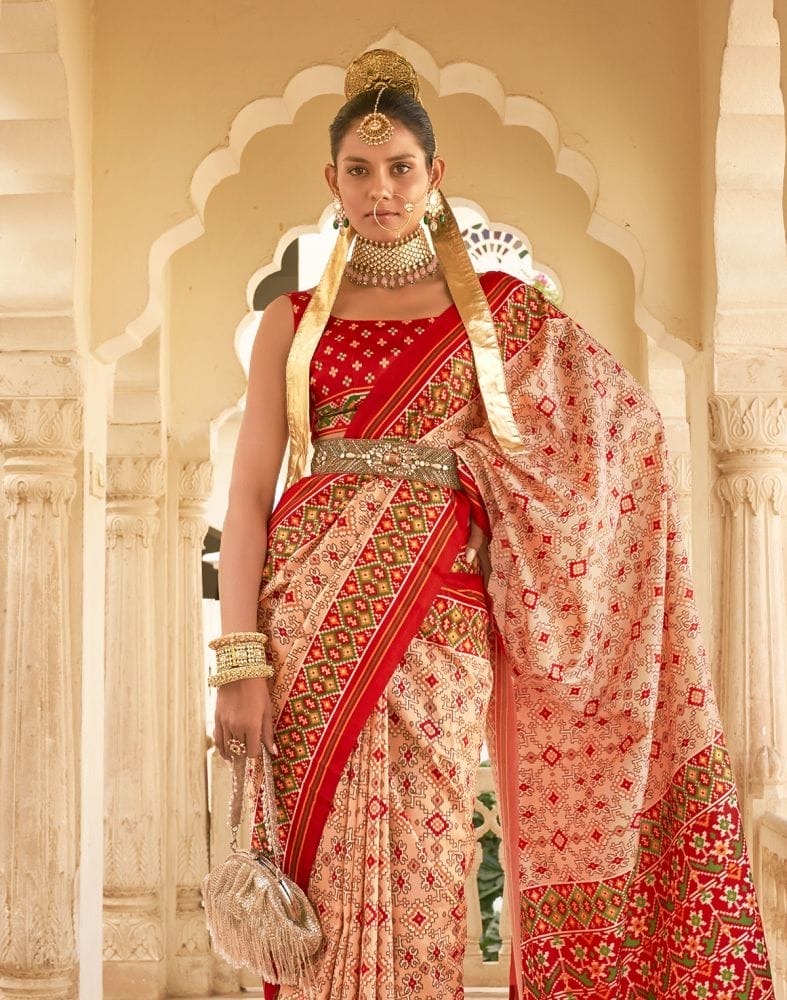 Collection of Peach Coloured Ikat Print Patola Fancy Saree in a gallery layout