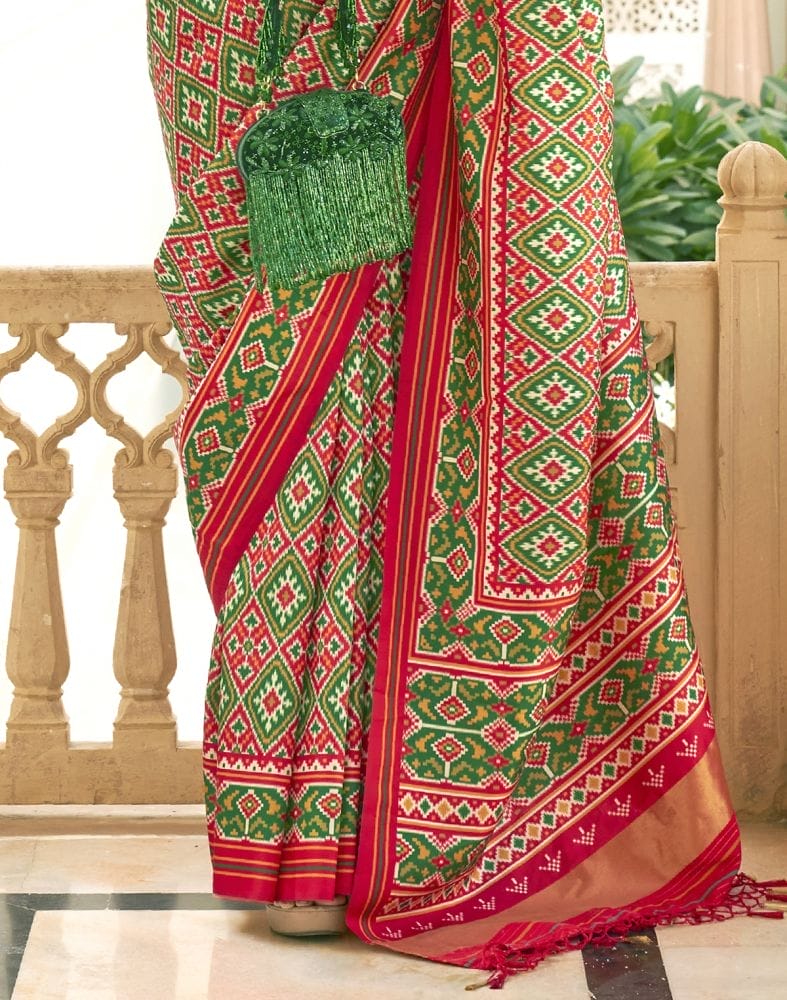 Collection of Ikat Print Green Coloured Patola Saree in a gallery layout