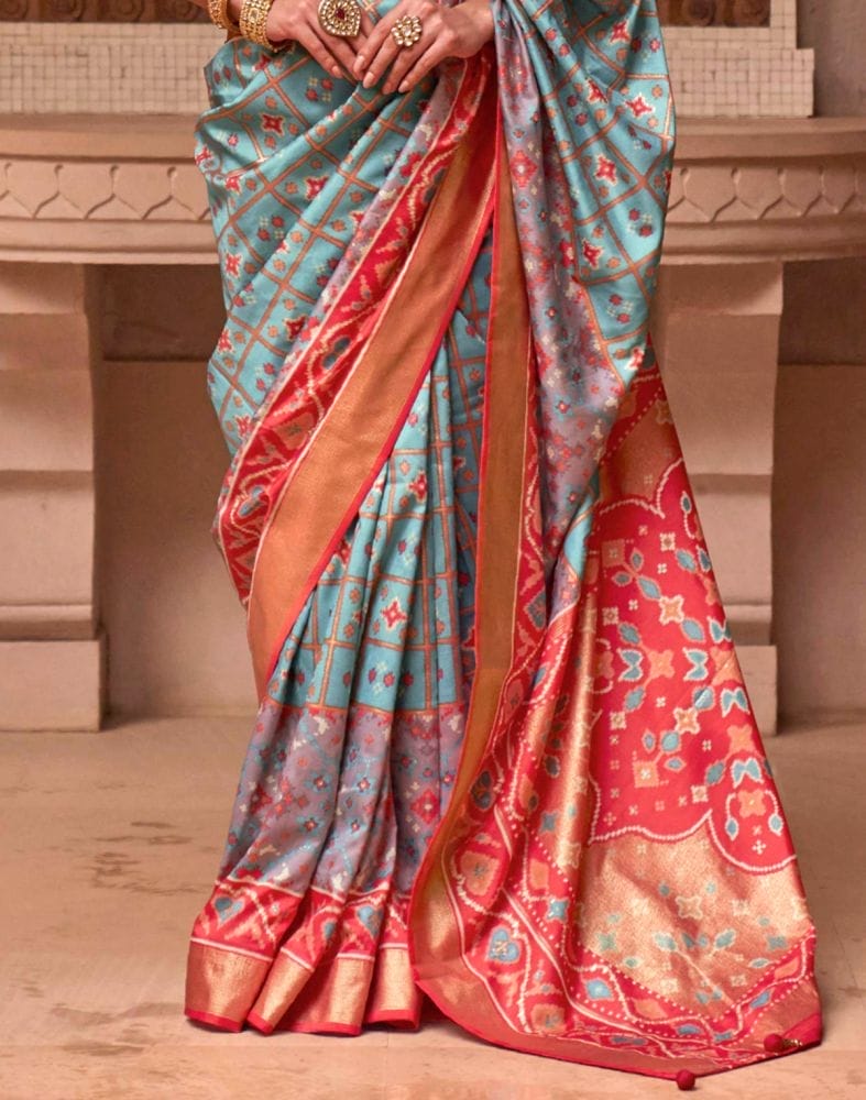 Collection of Stylish Sky Blue Color Ikat Print Patola Saree in a gallery layout