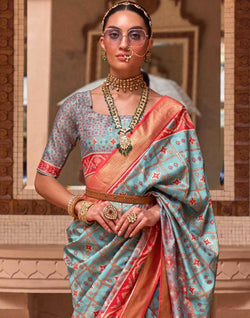 Collection of Stylish Sky Blue Color Ikat Print Patola Saree in a gallery layout