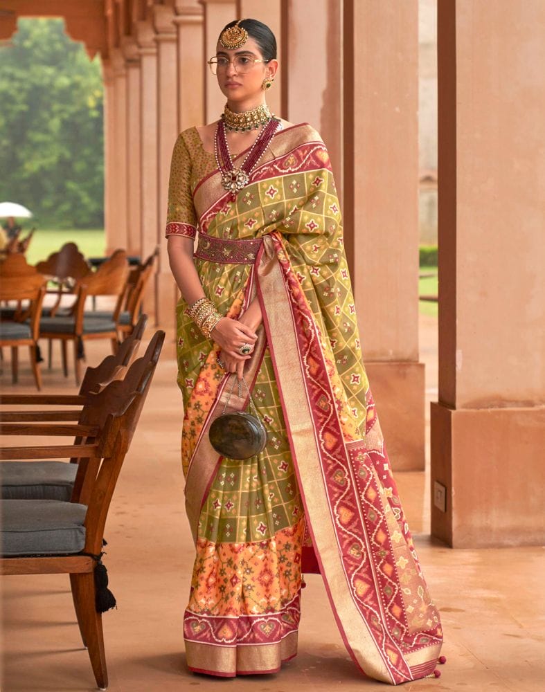 Collection of Light Mehendi Green Ikat Print Patola Saree in a gallery layout