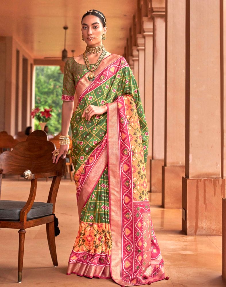 Collection of Trending Green Ikat Print Patola Saree in a gallery layout