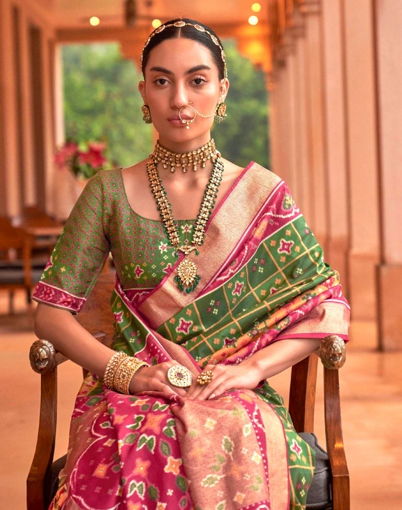 Collection of Trending Green Ikat Print Patola Saree in a gallery layout