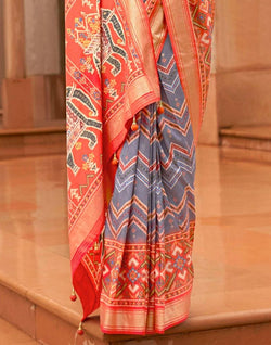 Collection of Grey and Orange Chevron Pattern Print Patola Saree in a gallery layout