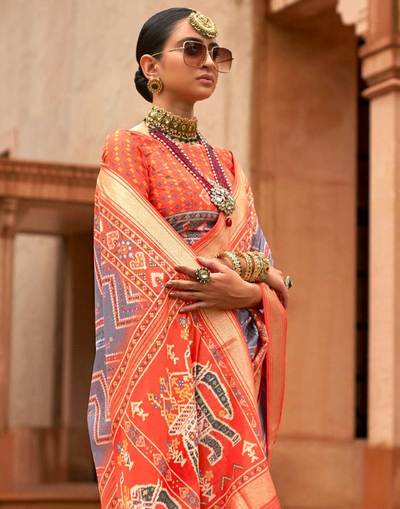 Collection of Grey and Orange Chevron Pattern Print Patola Saree in a gallery layout