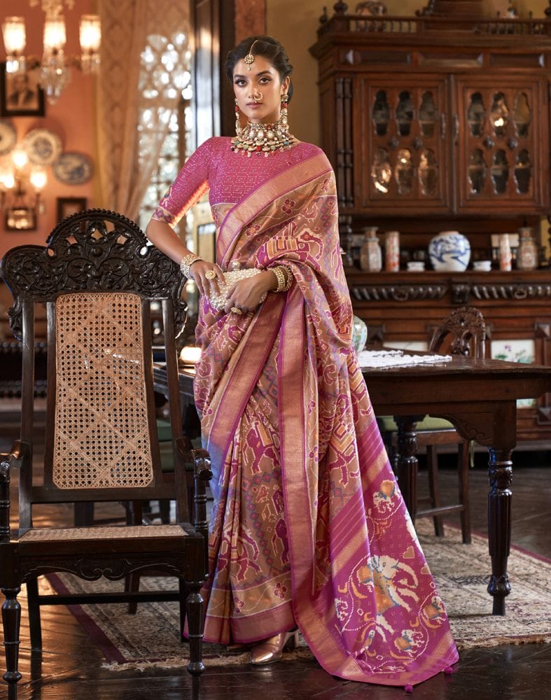 Collection of Peach Ikat Print Patola Fancy Saree in a gallery layout