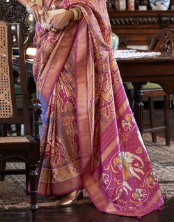 Collection of Peach Ikat Print Patola Fancy Saree in a gallery layout