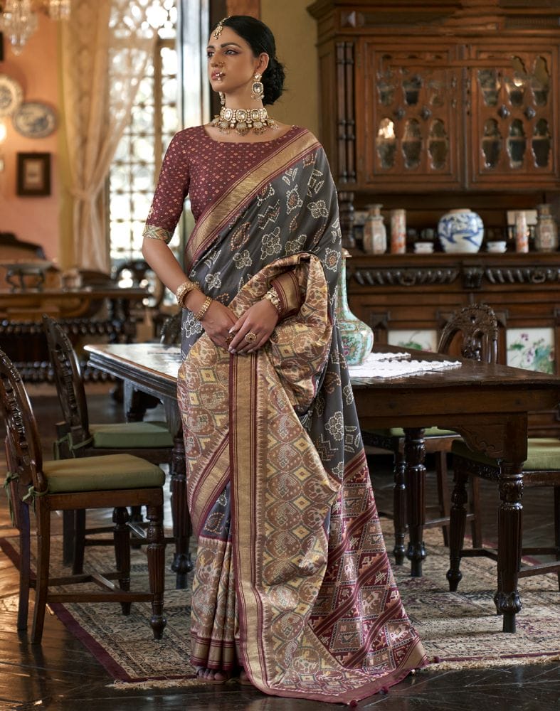 Collection of Grey Ikat Print Patola Fancy Saree in a gallery layout