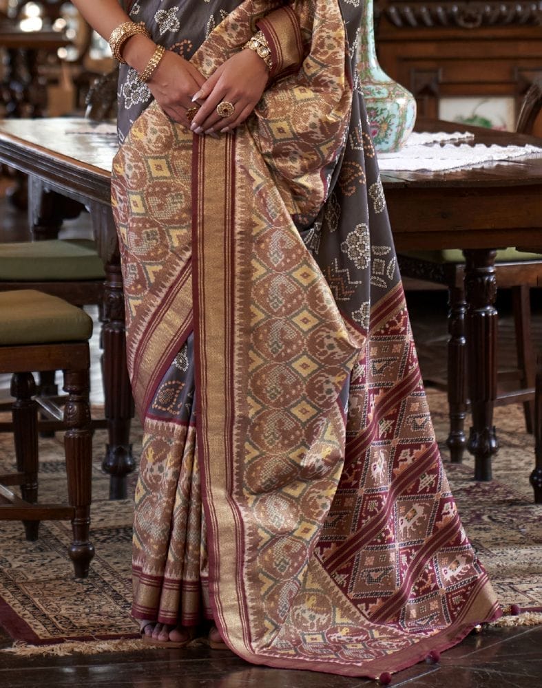 Collection of Grey Ikat Print Patola Fancy Saree in a gallery layout