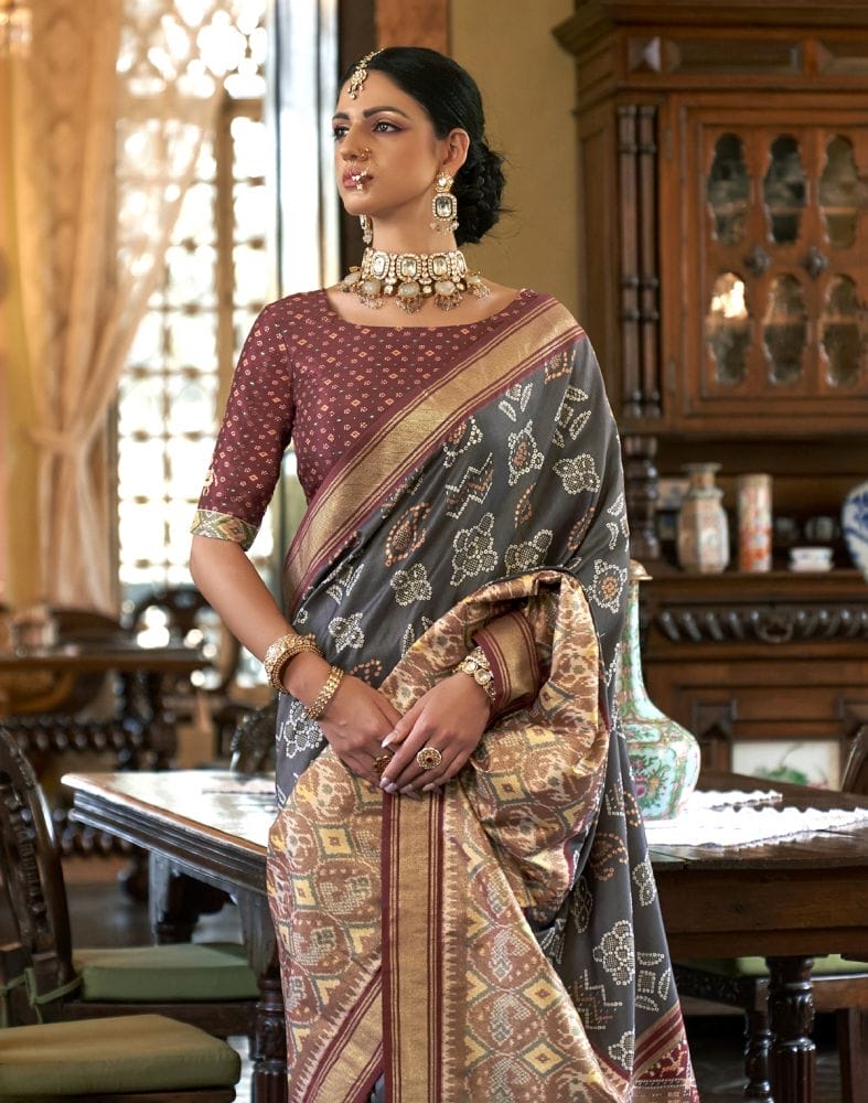 Collection of Grey Ikat Print Patola Fancy Saree in a gallery layout