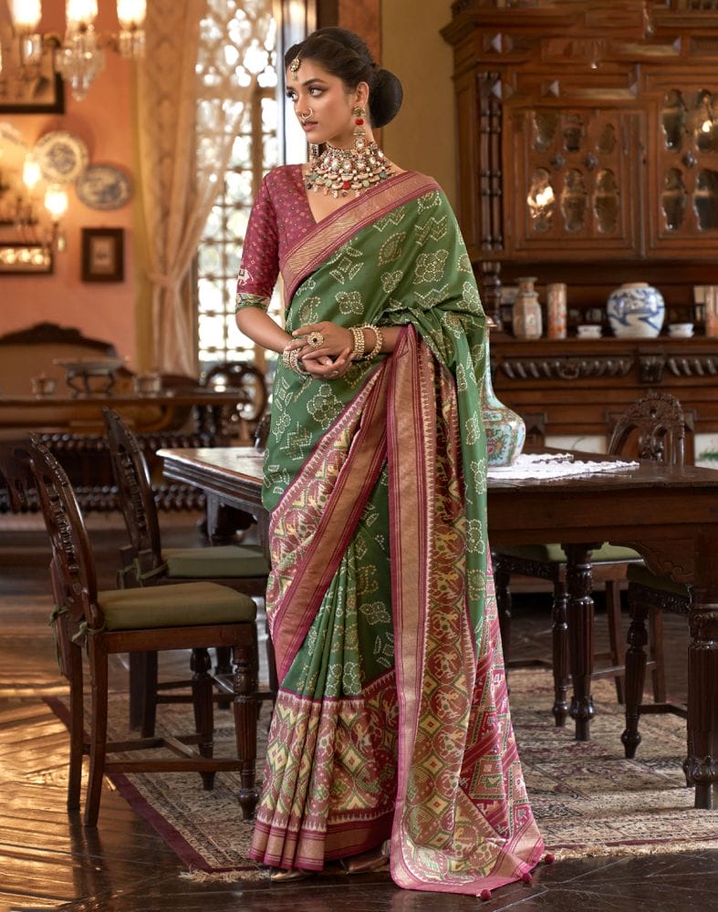 Collection of Green Coloured Woven Patola Fancy Saree in a gallery layout