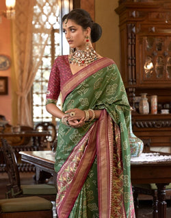 Collection of Green Coloured Woven Patola Fancy Saree in a gallery layout