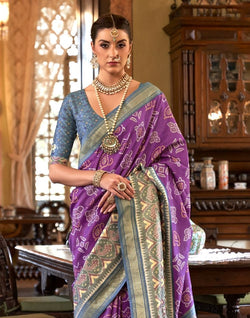 Collection of Purple and Grey Ikat Patola Saree in a gallery layout