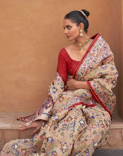 Collection of Beige and Red Coloured Hand Painted Brasso Saree in a gallery layout