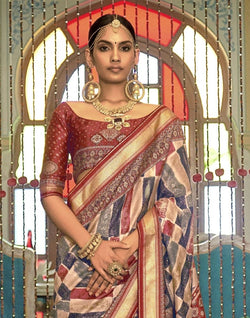 Collection of Multi Color Graphic Print Banaras Silk Patola Saree in a gallery layout